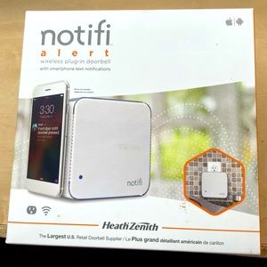 New Never Opened Notifi alert wireless plug-in doorbell